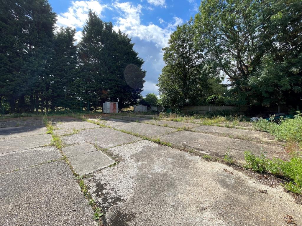 Lot: 39 - COMMERCIAL PROPERTY AND YARD WITH PLANNING - Alternative view across the yard front to back
